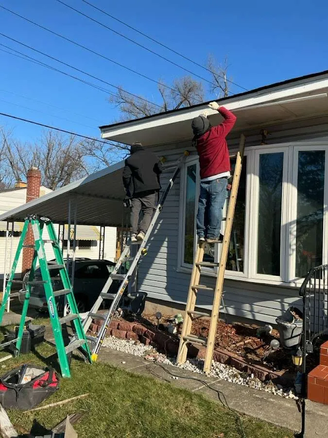 Restoration crew performing exterior repair in Apple Valley